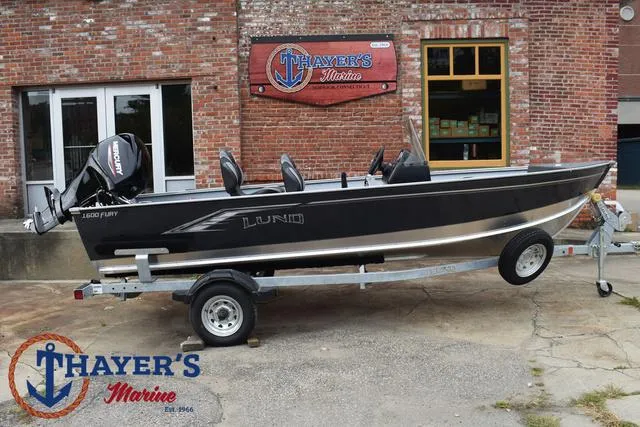 Slide: The Image of 2025 Lund 1600 Fury SS boat on trailer at Thayer's Marine. - 34