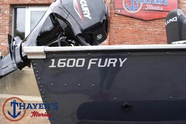 Slide: The Image of 2025 Lund 1600 Fury SS boat at Thayer's Marine, featuring Mercury engine. - 5