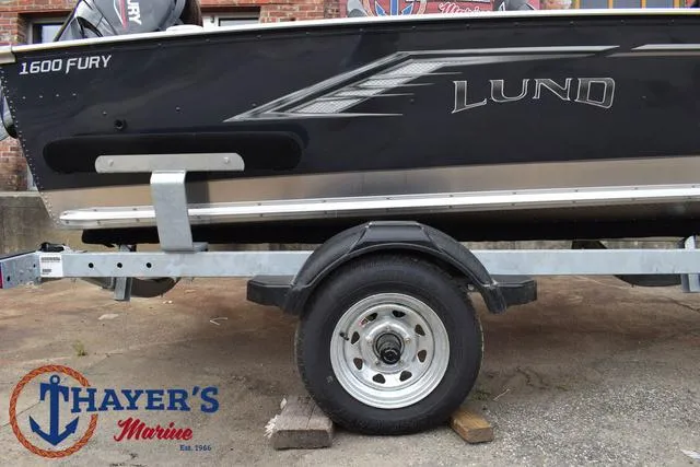 Slide: The Image of 2025 Lund 1600 Fury SS boat on trailer at Thayer's Marine. - 6