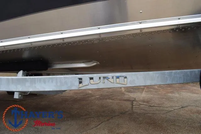 Slide: The Image of 2025 Lund 1600 Fury SS boat on trailer at Thayer's Marine. - 7