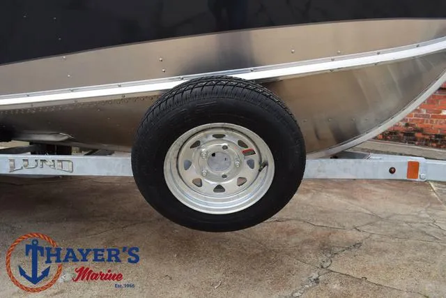 Slide: The Image of 2025 Lund 1600 Fury SS boat on trailer at Thayer's Marine. - 8