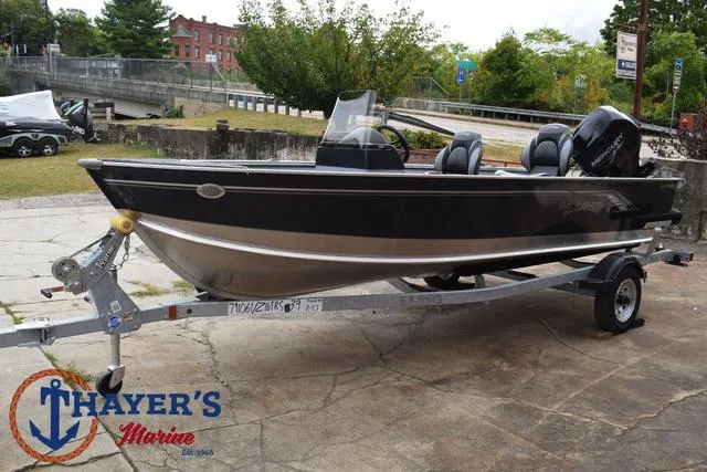 Slide: The Image of 2025 Lund 1600 Fury SS boat on trailer at Thayer's Marine. - 9