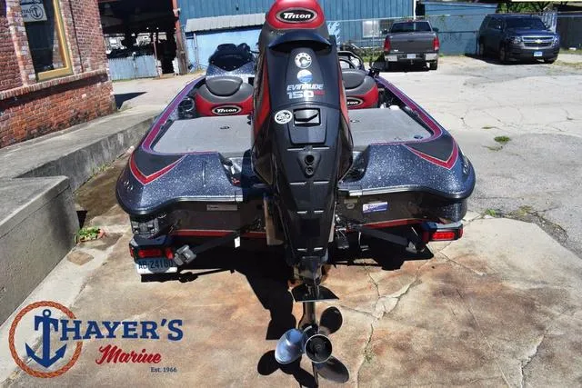 Slide: The Image of 2015 Triton 189 TRX boat with Evinrude motor at Thayer's Marine. - 10