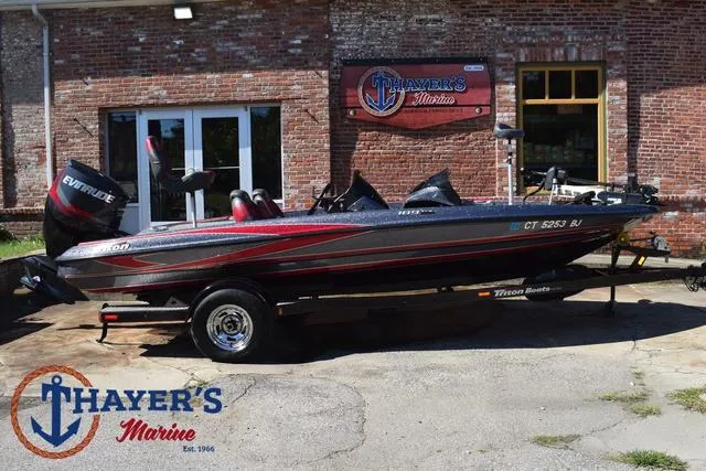 Slide: The Image of 2015 Triton 189 TRX boat at Thayer's Marine dealership. - 2