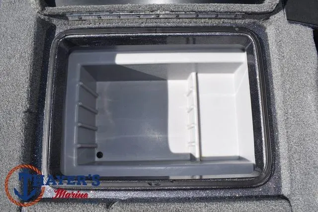 Slide: The Image of 2015 Triton 189 TRX boat storage compartment, gray interior, Mayer's Marine logo. - 35