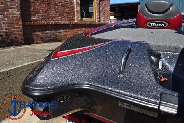 Slide: The Image of 2015 Triton 189 TRX boat with sleek design and metallic finish. - 40