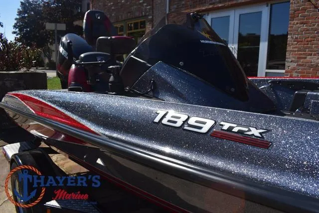 Slide: The Image of 2015 Triton 189 TRX boat with sleek design, displayed at Thayer's Marine. - 41