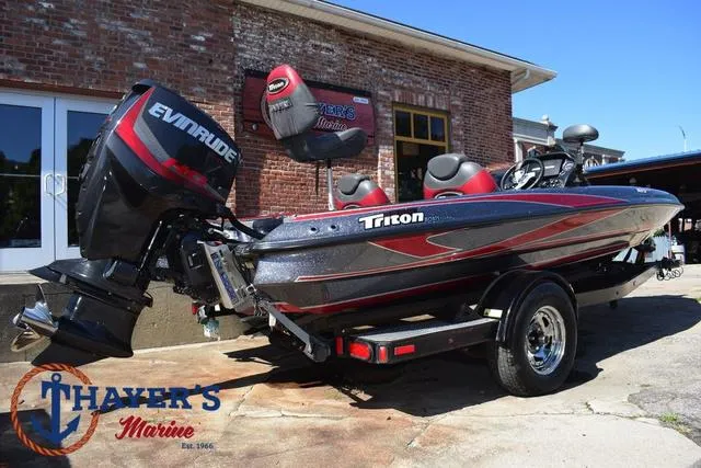 Slide: The Image of 2015 Triton 189 TRX boat with Evinrude engine at Thayer's Marine. - 43
