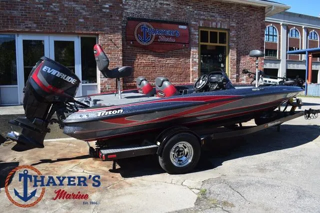 Slide: The Image of 2015 Triton 189 TRX boat with Evinrude motor at Thayer's Marine. - 44