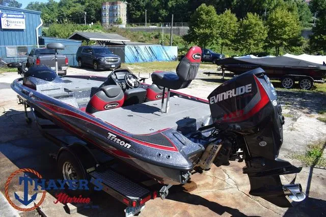 Slide: The Image of 2015 Triton 189 TRX bass boat with Evinrude engine at Thayer's Marine. - 9