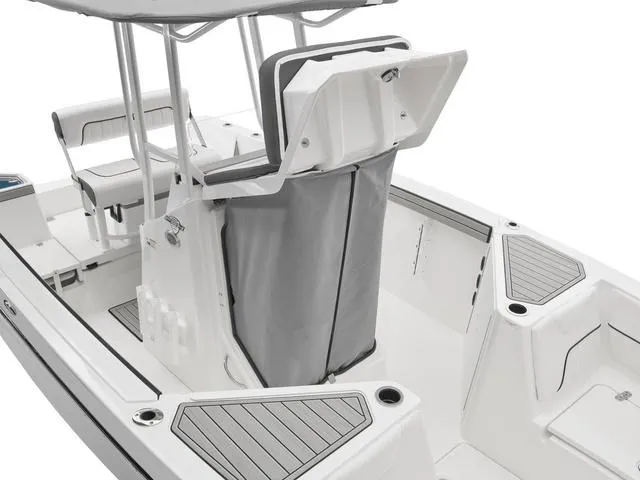 Slide: The Image of 2025 Yamaha Boats 220 FSH Sport interior with seating and storage compartments. - 5