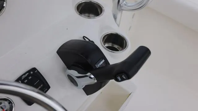 Slide: The Image of Throttle control on 2025 Key West 203 FS boat dashboard. - 10