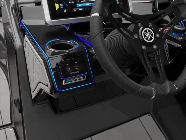 Slide: The Image of 2025 Yamaha Boats 255XE dashboard with steering wheel and control panel. - 10
