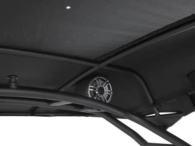 Slide: The Image of 2025 Yamaha Boats 255XE speaker system under black canopy. - 13