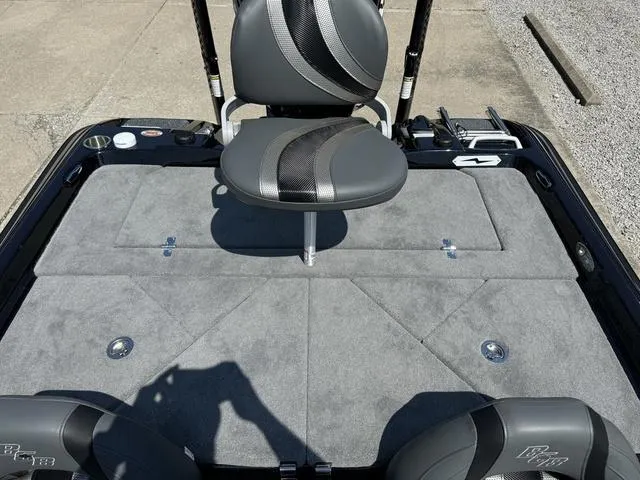 Slide: The Image of 2025 Bass Cat Cougar FTD boat deck with swivel seat and storage compartments. - 27