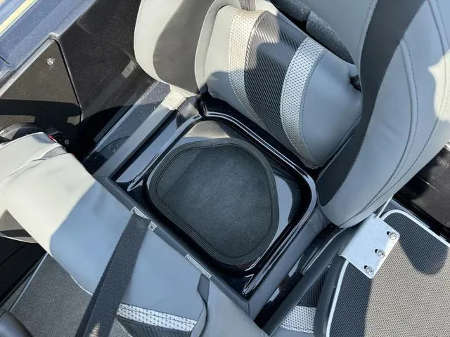 Slide: The Image of 2025 Bass Cat Cougar FTD boat interior with gray and black seating. - 29