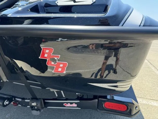 Slide: The Image of 2025 Bass Cat Cougar FTD boat with logo and trailer detail. - 3