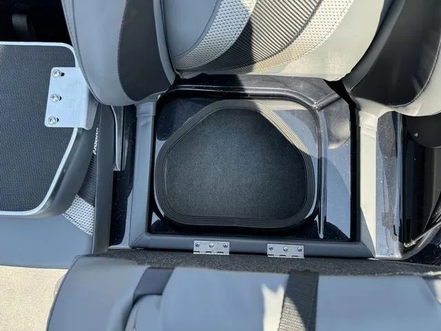 Slide: The Image of 2025 Bass Cat Cougar FTD boat interior with storage compartment and seating. - 31