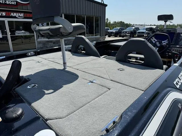 Slide: The Image of 2025 Bass Cat Cougar FTD boat with spacious deck and seating. - 5