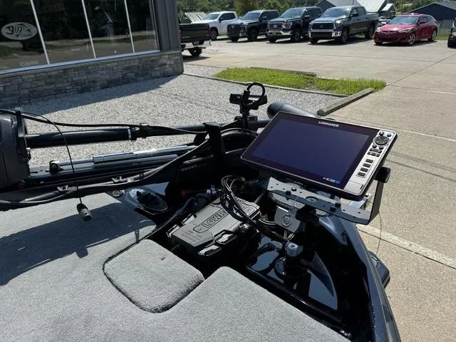 Slide: The Image of 2025 Bass Cat Cougar FTD boat with advanced navigation system and trolling motor. - 8