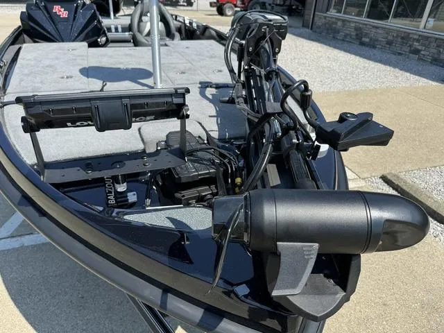 Slide: The Image of 2025 Bass Cat Cougar FTD boat with advanced fishing equipment and sleek design. - 9