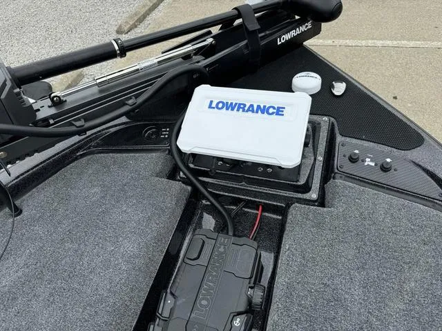 Slide: The Image of Phoenix 920 Elite 2025 boat with Lowrance electronics and trolling motor. - 11