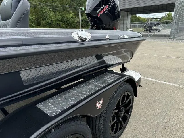 Slide: The Image of 2025 Phoenix 920 Elite boat on trailer, featuring sleek design and modern detailing. - 20