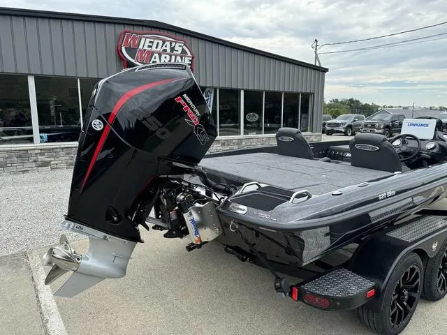 Slide: The Image of 2025 Phoenix 920 Elite boat with powerful engine at Wieda's Marine dealership. - 3