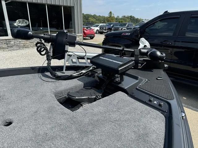 Slide: The Image of 2025 Phoenix 721 ZXL boat with advanced trolling motor in parking lot. - 15