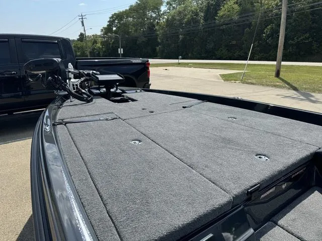 Slide: The Image of 2025 Phoenix 721 ZXL boat deck with gray carpet and mounted equipment. - 21