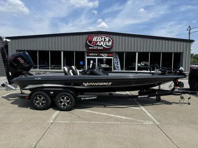 Slide: The Image of 2025 Phoenix 721 ZXL boat displayed at Ieda's Marine dealership. - 6