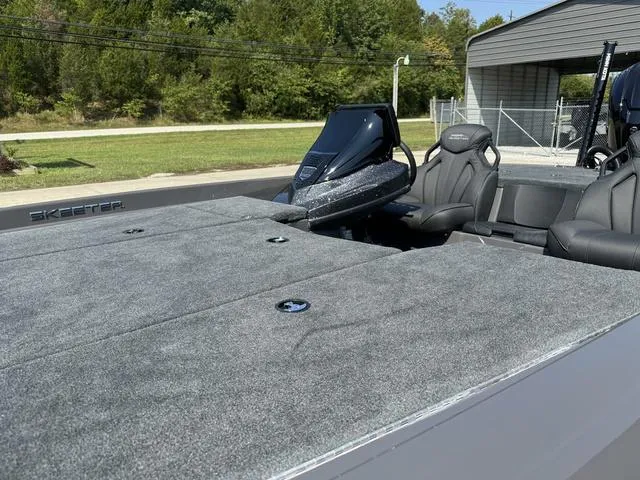 Slide: The Image of 2025 Skeeter ZXR 20 boat interior with seating and control panel. - 12