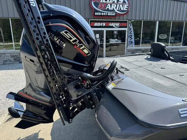 Slide: The Image of 2025 Skeeter ZXR 20 boat with powerful engine at dealership. - 3