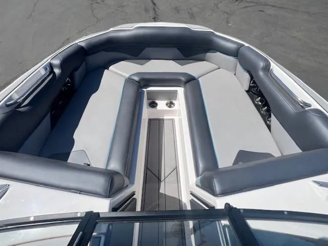 Slide: The Image of 2021 Moomba Makai boat interior with spacious seating and sleek design. - 16