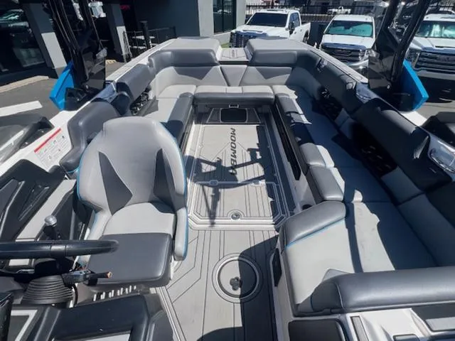 Slide: The Image of 2021 Moomba Makai boat interior with spacious seating and modern design. - 17