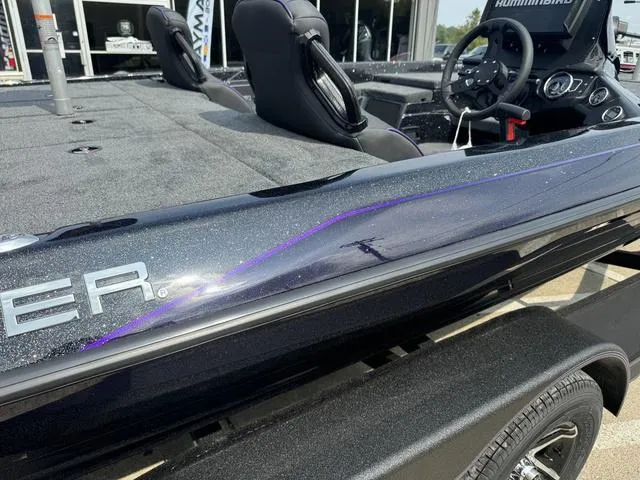 Slide: The Image of 2025 Skeeter ZXR20 boat with sleek design and modern interior features. - 5