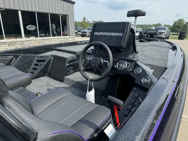 Slide: The Image of 2025 Skeeter ZXR20 boat interior with Humminbird electronics and sleek seating. - 7