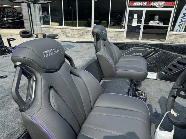 Slide: The Image of Skeeter ZXR20 2025 boat interior with sleek, modern seating design. - 8