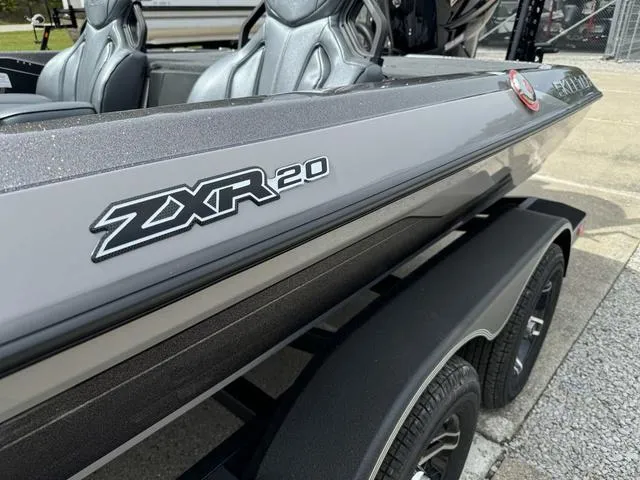 Slide: The Image of 2025 Skeeter ZXR20 boat, sleek design, gray finish, close-up view. - 16