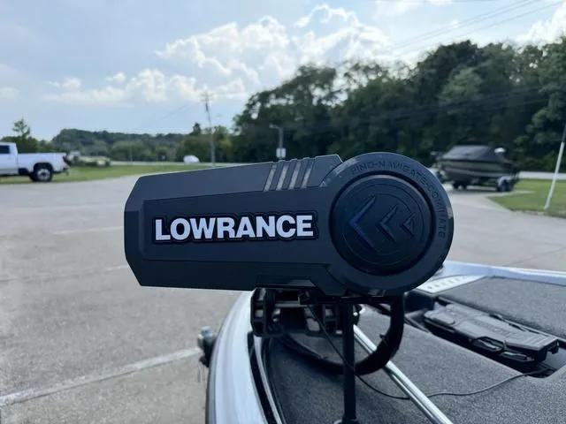Slide: The Image of Lowrance device on 2023 Triton 19 TrX Patriot boat in parking lot. - 15