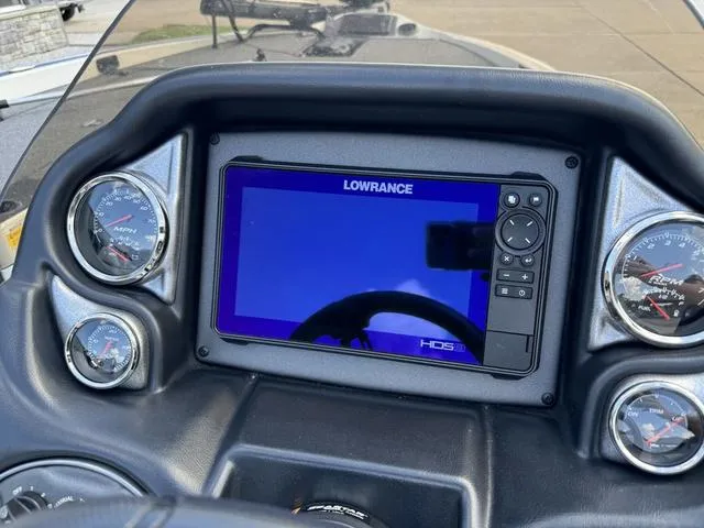 Slide: The Image of Dashboard of 2023 Triton 19 TrX Patriot with Lowrance HDS display and gauges. - 7