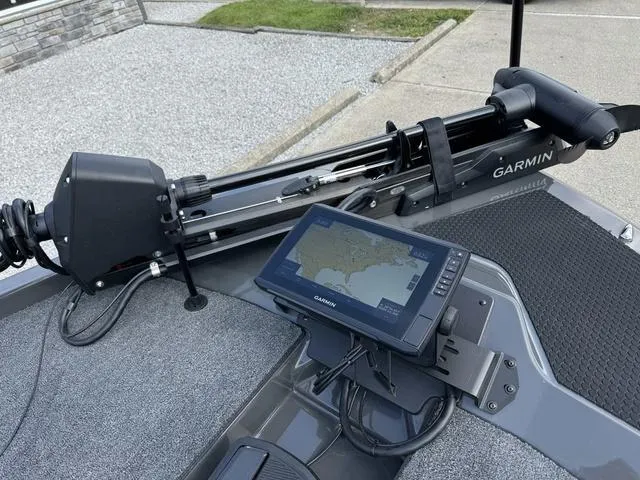 Slide: The Image of iKon VLX 21 boat with Garmin navigation system, 2025 model, featuring advanced fishing technology. - 11