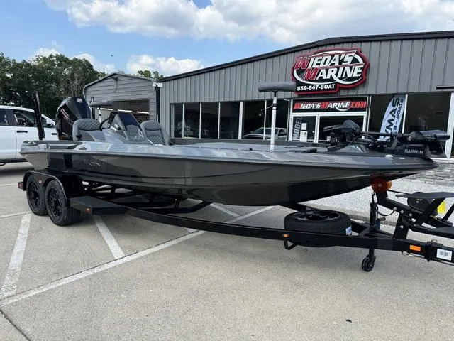 Slide: The Image of 2025 iKon VLX 21 boat on trailer outside dealership. - 12