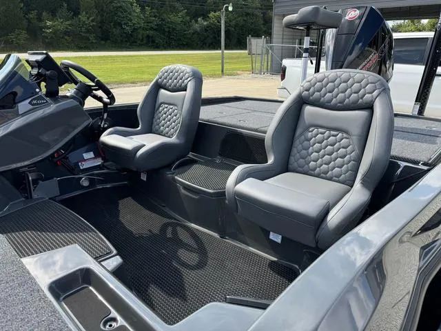 Slide: The Image of 2025 iKon VLX 21 boat interior with two gray cushioned seats. - 16