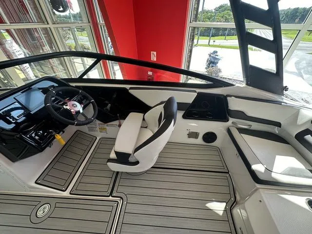 Slide: The Image of 2024 Yamaha Boats 195S interior with sleek design and modern dashboard. - 3