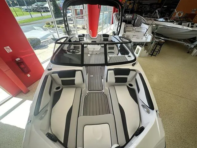 Slide: The Image of 2024 Yamaha Boats 195S interior, sleek design with spacious seating and modern features. - 7