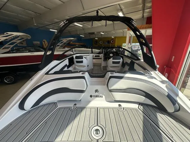 Slide: The Image of 2024 Yamaha Boats 195S interior, sleek design, spacious seating, modern features. - 9