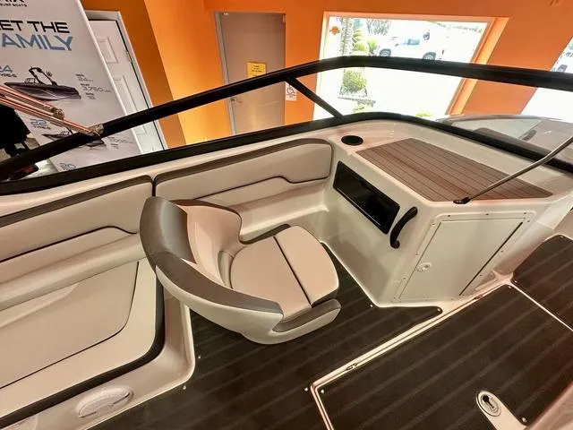 Slide: The Image of 2024 Yamaha Boats SX190 interior with sleek seating and modern design. - 7