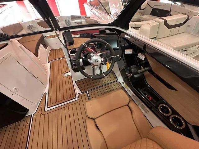 Slide: The Image of Interior of 2025 Yamaha Boats 222S, featuring sleek design and modern controls. - 7