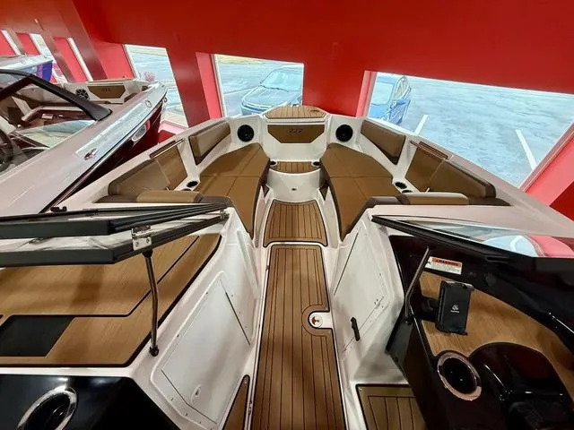 Slide: The Image of 2025 Yamaha Boats 222SD interior with sleek design and comfortable seating. - 11